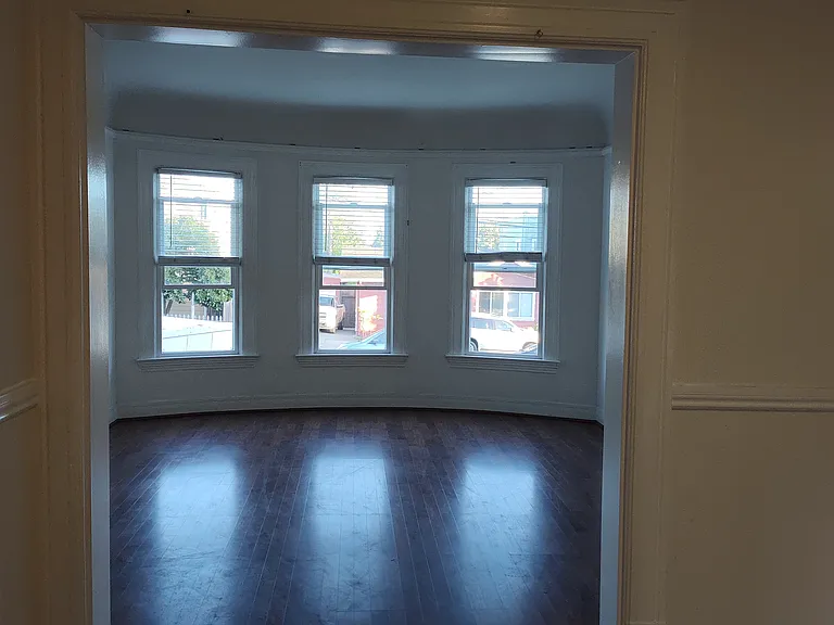 standing in the dining room looking towards the livingroom