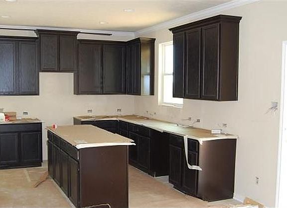 Beautiful kitchen with island and large cabinets