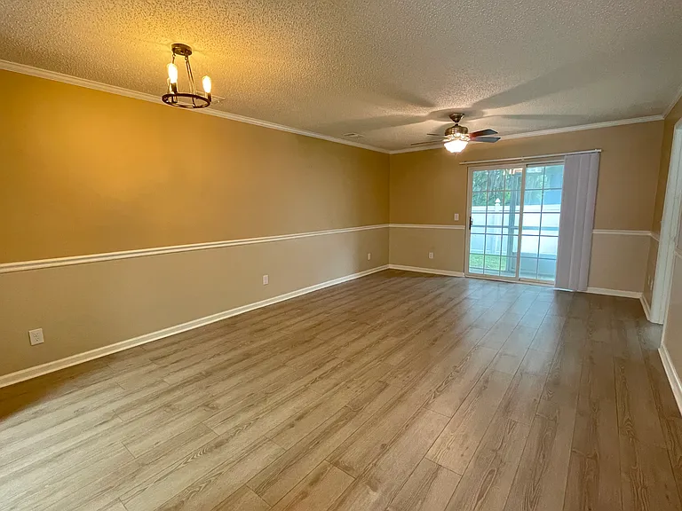 Open-concept living and dining area with lots of natural light