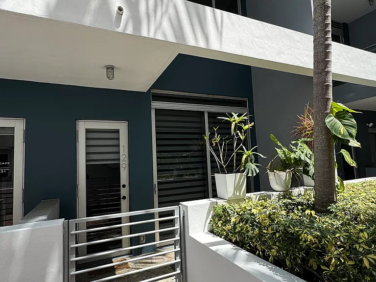 Secondary Entrance - Private secondary entrance tucked away in a quiet alley, offering added privacy and convenience. Step directly onto your own balcony with immediate access to nearby restaurants and cafes just feet away_perfect for seamless city living