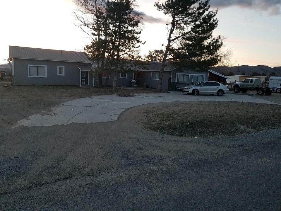 2 apartments, each has own entrance in front and back. The 1 bedroom side is the left part section where roof is raised. Neighbors are young nice couple with dogs and horses