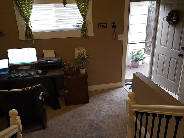 Office space between upstairs and downstairs. Laundry and coat closet are to the right.