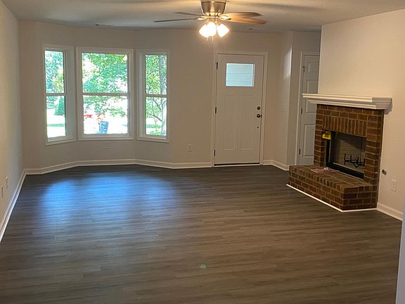 Living room with gas fireplace.
