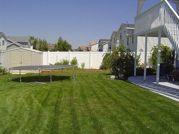 Backyard--2 sheds, patio & deck