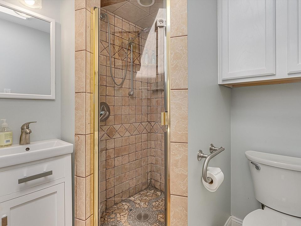 Bathroom, shower, sink and toilet