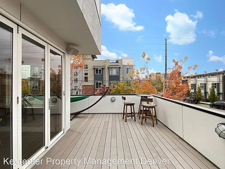 Second floor outdoor space with accordion doors