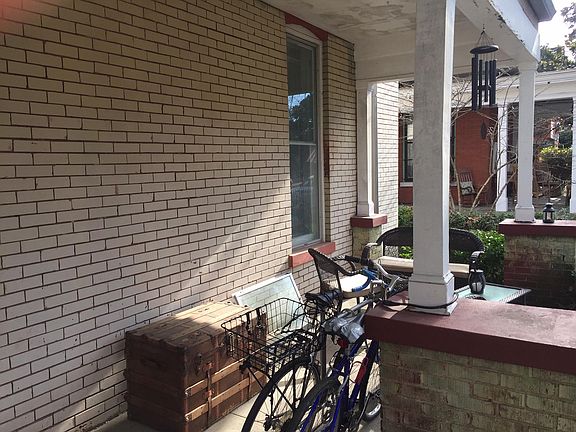 Covered front porch with furniture included