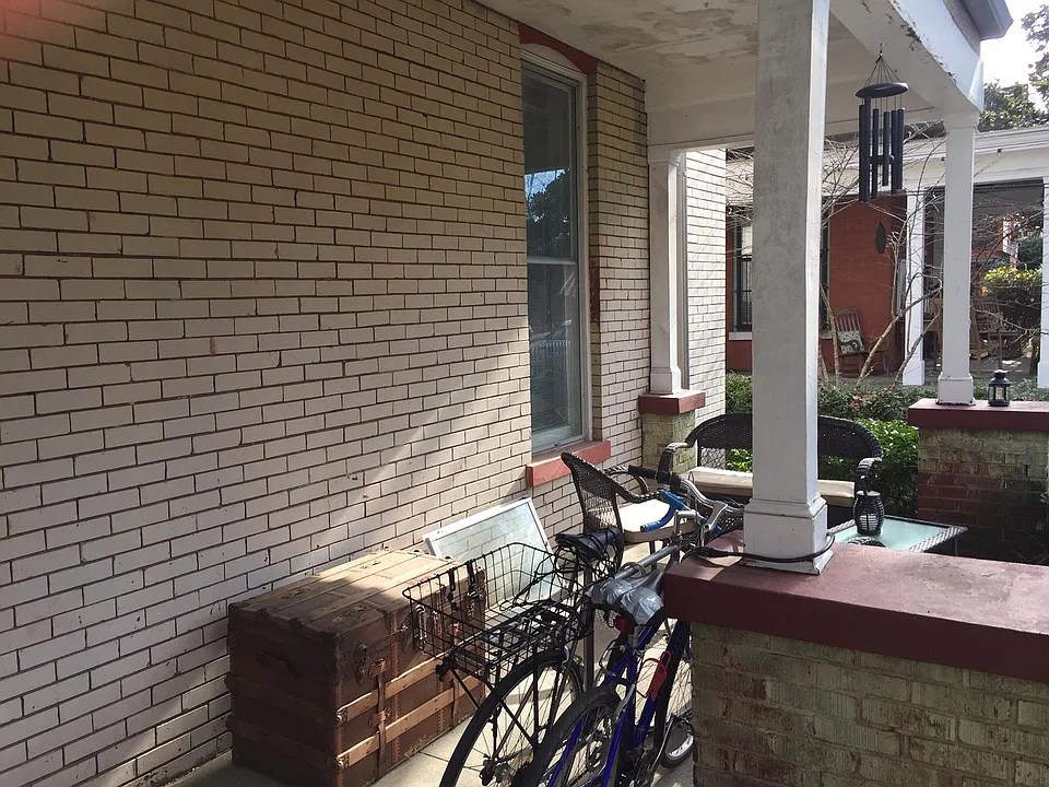 Covered front porch with furniture included