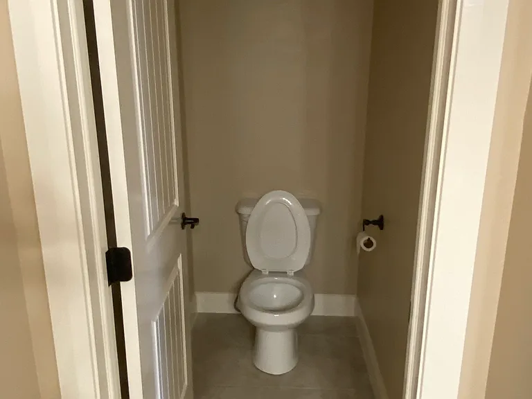 Private toilet in main bedroom