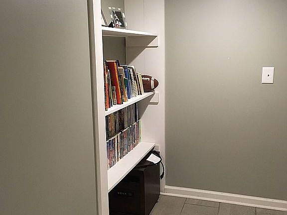 Basement hallway w/built ins