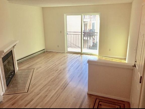 Spacious open floor plan with hardwood floors