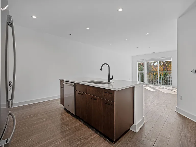 Modern Kitchen with Center Island and Sleek Wood Cabinetry
