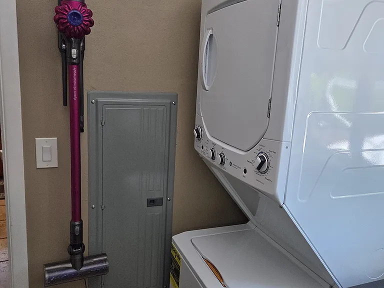 Laundry washer/dryer and wireless vacuum cleaner
