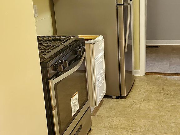 Galley Kitchen - View #2 w/ new gas range stainless fridge
