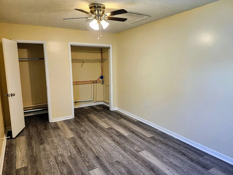 Bedroom with new ceiling fan.