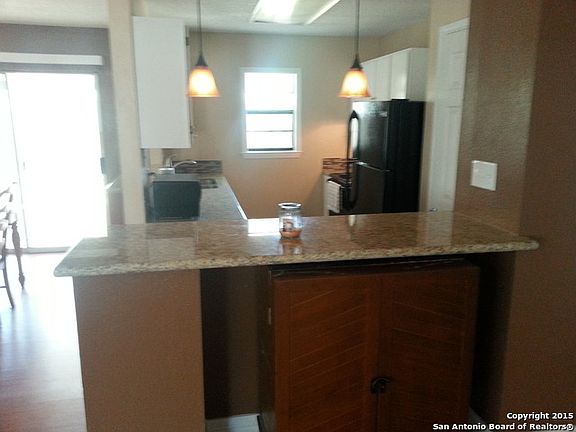 5th image of 9262 Village Brown