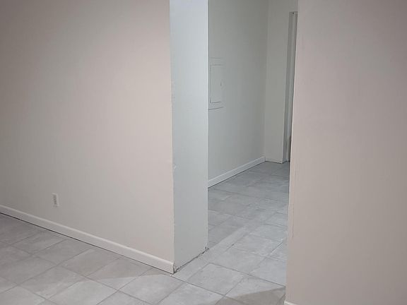 Bedroom #1; entryway to kitchen
