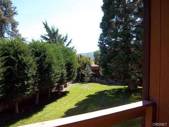 View of side yard from the front deck