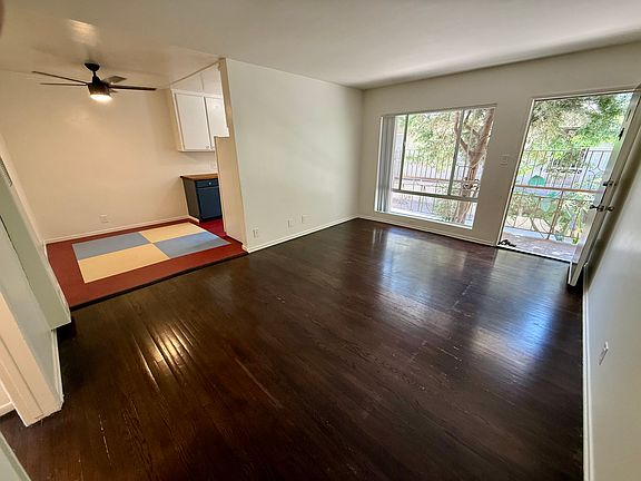 Living room with open dining room