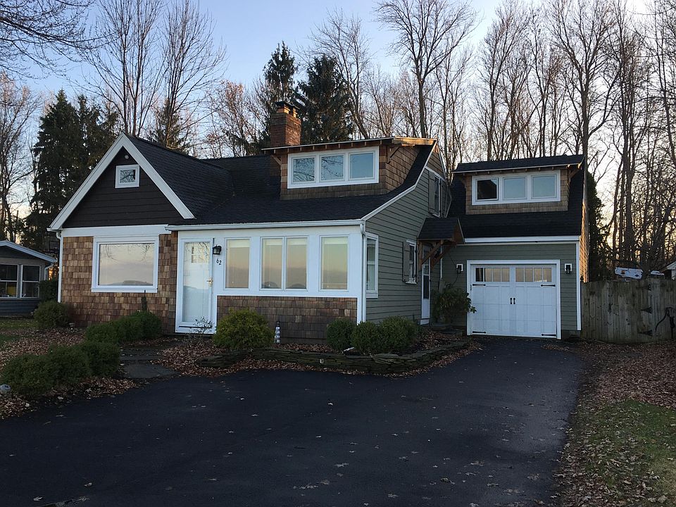 The front of the house which shows the garage and awesome extra room above it.