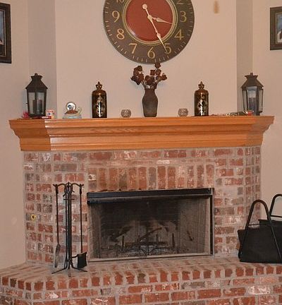 Corner wood burning fireplace