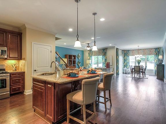 The Cambridge Kitchen Dining Living This is a model representation, not the actual home