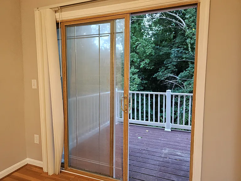 Deck entrance from dining area, perfect for a morning cup of coffee!