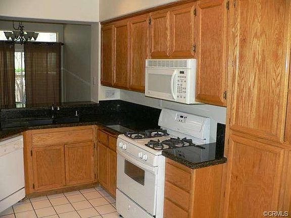 Walnut Laminate Wood Flooring in Living and Dining Area just ins