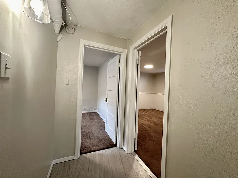 3rd bedroom (conforming) on left, family room or 4th non-conforming bedroom on right