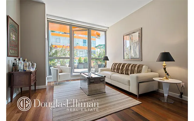 Sold by Douglas Elliman | media 18