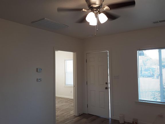 Living room - front door and view to front bedroom
