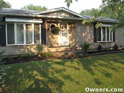 Stone entrance and porch, Fresh Landscaping