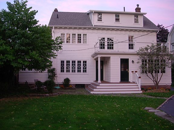 back of house, new mahogany deck, new paint and glazing on all windows