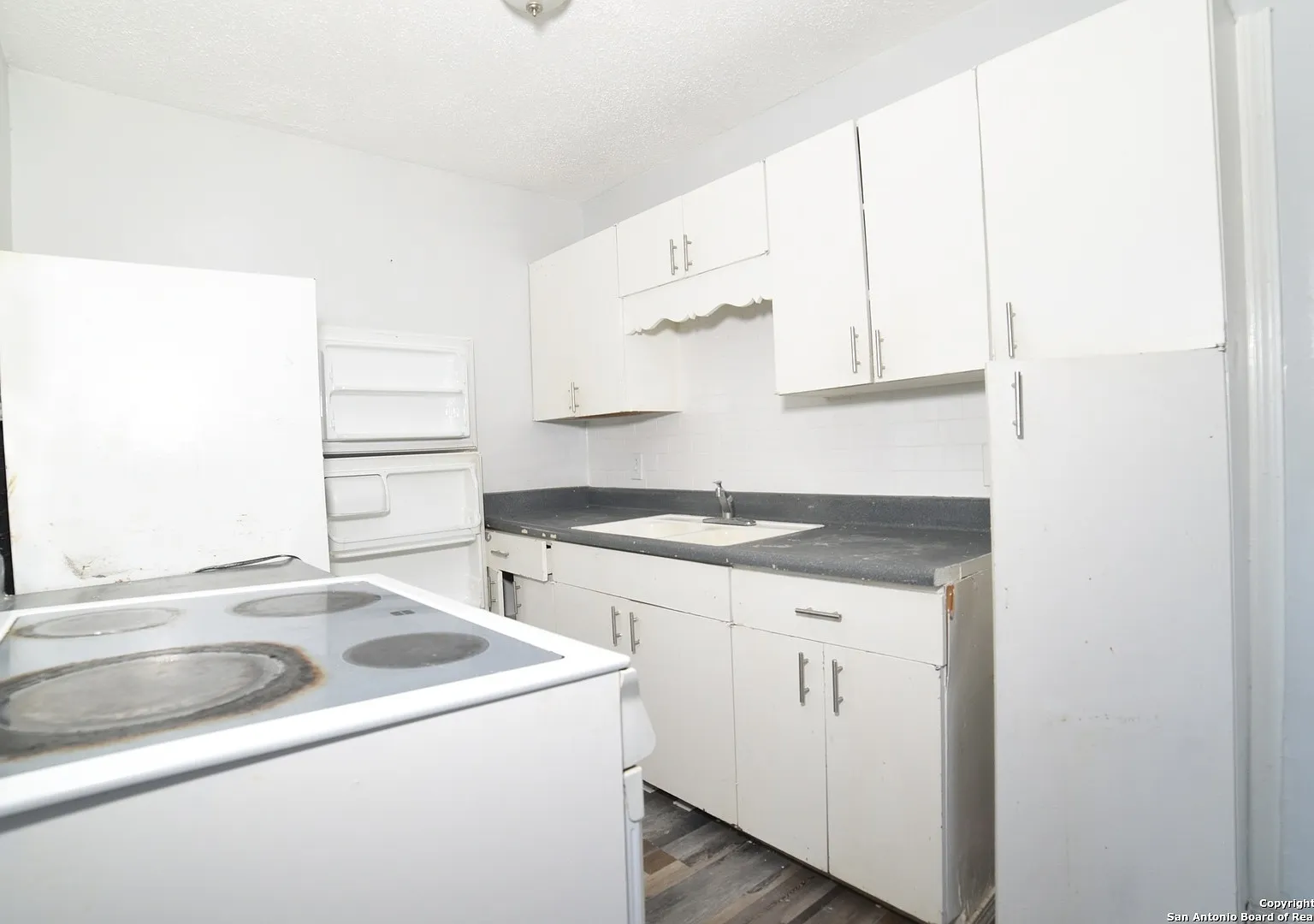 6641 Little Village Apartments — Photo 2