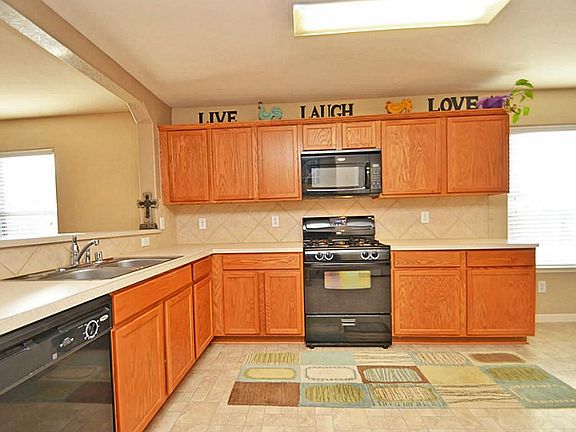 Kitchen with eating bar area.