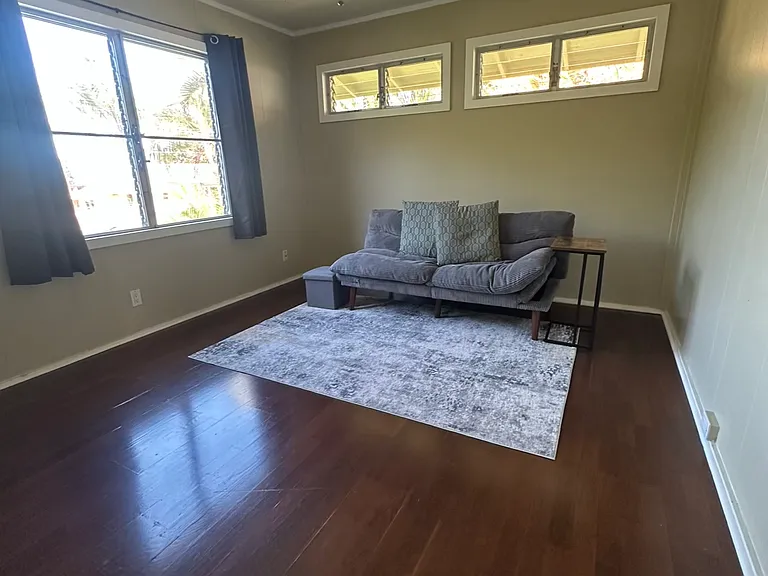 Living area with unobstructed view of yard and cul-de-sac.