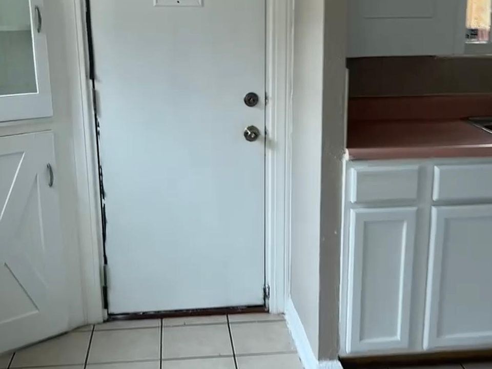Back door leading to enclosed Porch