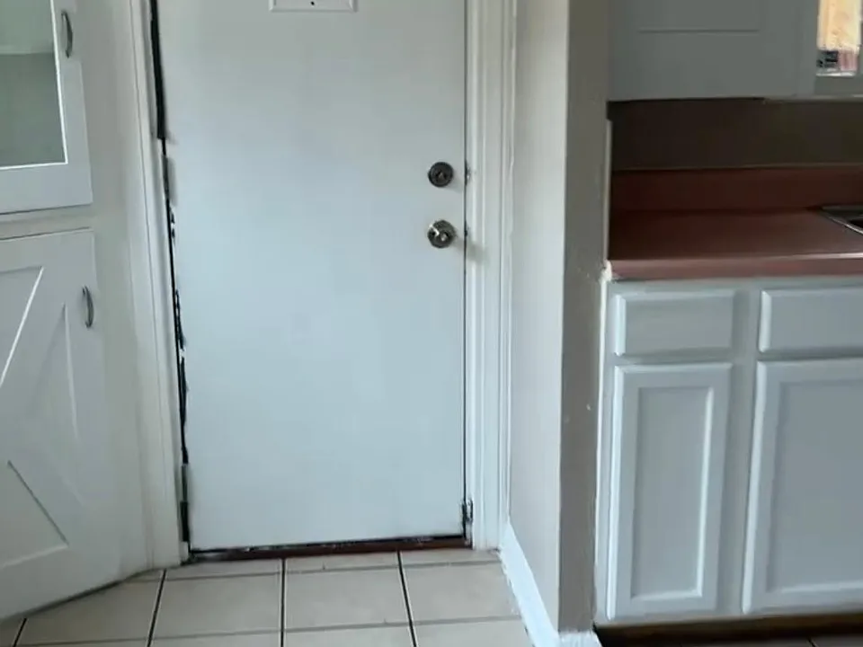 Back door leading to enclosed Porch