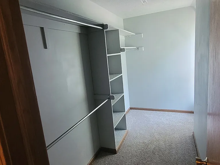 Bedroom walk-in closet.