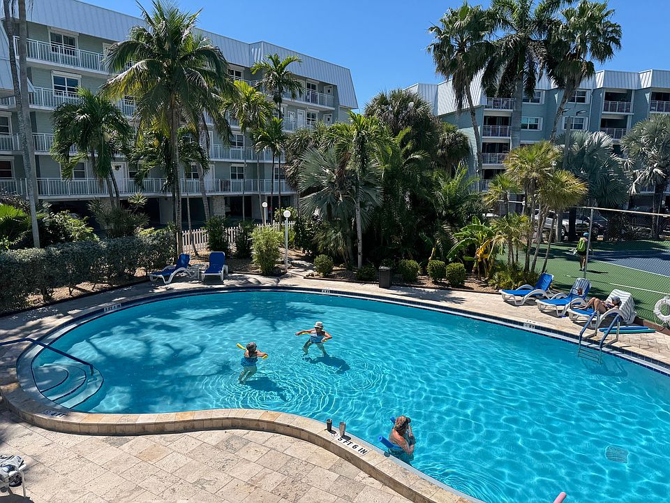 Large sun filled swimming pool.