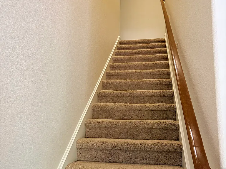 Upstairs to bedroom, full bath and media or home office space