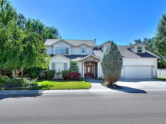 Impressive entry with pillars and stonework