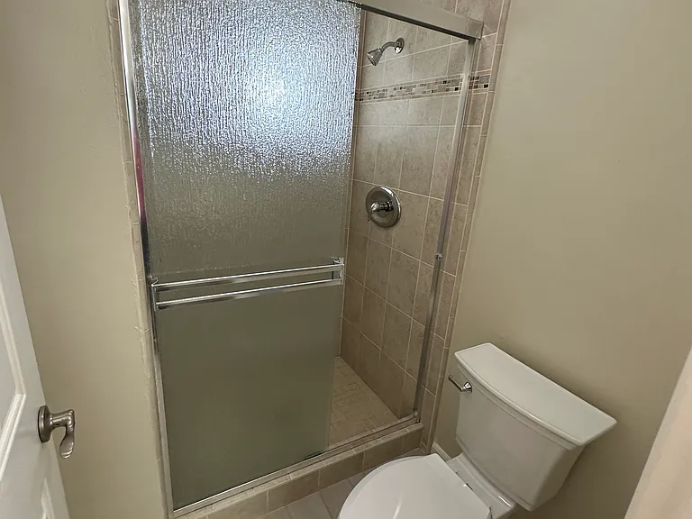 Primary bath with large stall shower.