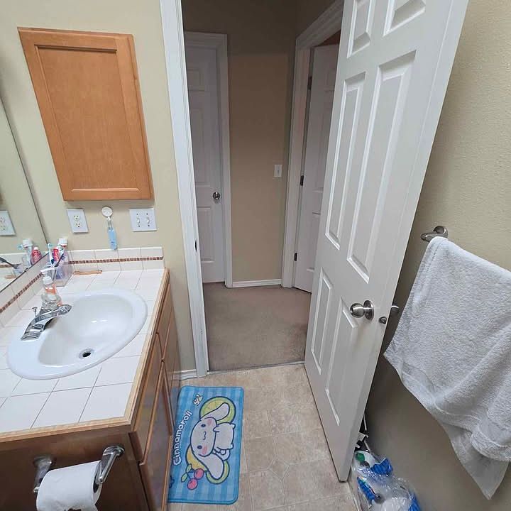 The bathroom you'll be sharing - that's the door to your room you can see to the left.