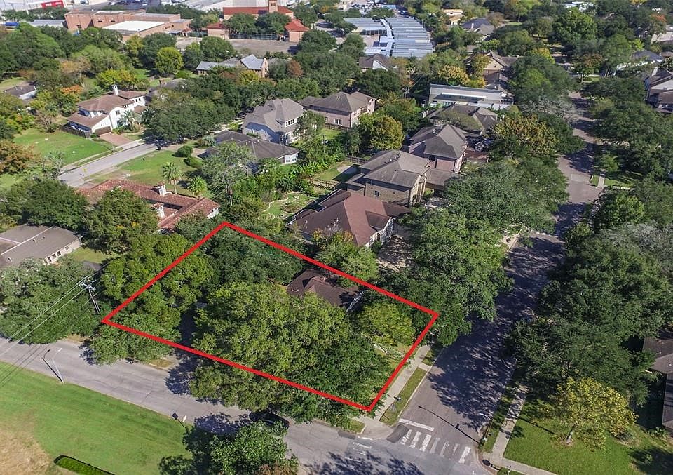 This oversized corner lot with lush greenery is the ideal place to build your dream home.