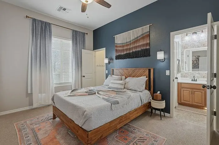 Rest, recharge, and unwind in your private guest bedroom oasis. Queen sized bed and shared Jack and Jill bathroom.