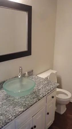 Half bath near kitchen, basement, garage