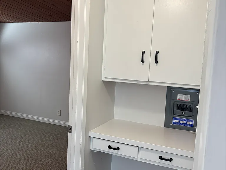 Built in console in the hallway outside the bedrooms