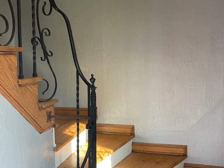 stairs to front door ( also a back door to driveway not shown)