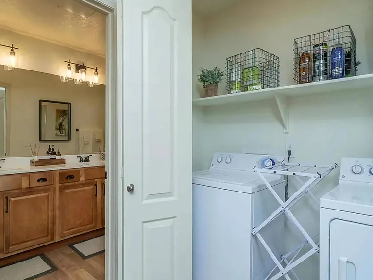 Full-Size In-Unit Washer and Dryer with Overhead Storage Shelf